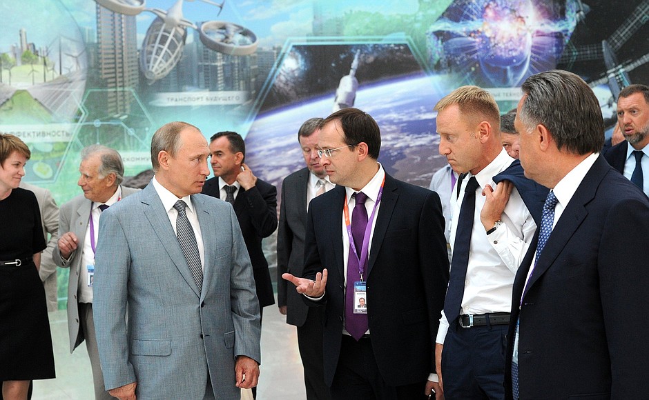 With Culture Minister Vladimir Medinsky, Education and Science Minister Dmitry Livanov and Sports Minister Vitaly Mutko (left to right). During the presentation of the concept of the City of the Future educational and recreation centre.