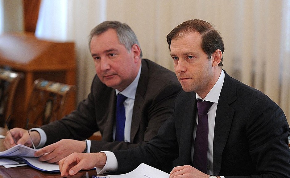 At the meeting on economic issues. Deputy Prime Minister of the Russian Federation Dmitry Rogozin (left) and Industry and Trade Minister Denis Manturov.