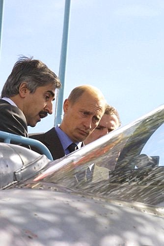 President Vladimir Putin and Mikhail Pogosyan, Sukhoi R&D bureau CEO, inspecting a SU-30 MKK jet at the 5th Moscow aerospace show MAKS 2001.