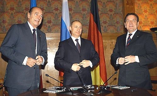 President Putin with French President Jacques Chirac and German Federal Chancellor Gerhard Schroeder.