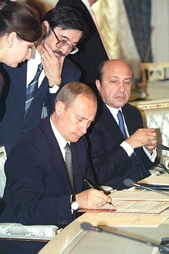 During the signing of documents.