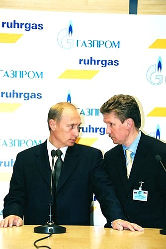 Joint stand of Germany\'s leading natural gas distributor Ruhrgas AG and Russian Gazprom: President Vladimir Putin and Gazprom board chairman Alexei Miller, Messe Dusseldorf exhibition complex.