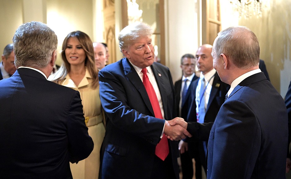After the joint news conference of President of Russia Vladimir Putin and US President Donald Trump. First Lady of the United States Melania Trump (in the background).