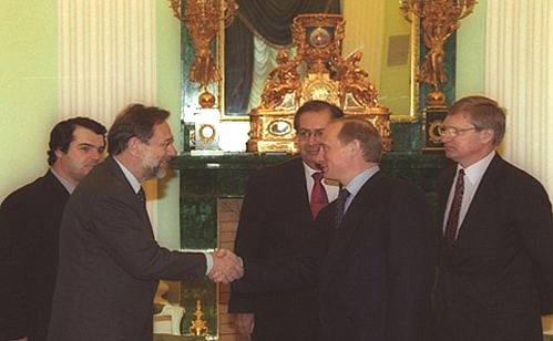 Vladimir Putin with Jaime Gama (centre background), foreign minister of Portugal, current holder of the European Union presidency, and Javier Solana (centre left), secretary-general of the EU Council.