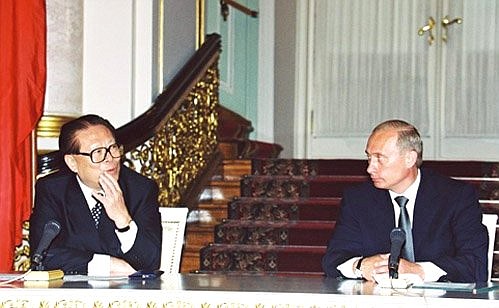 President Putin with Chinese President Jiang Zemin at a news conference following Russian-Chinese negotiations.