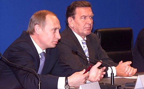 President Putin with Gerhard Schroeder at a joint news conference.