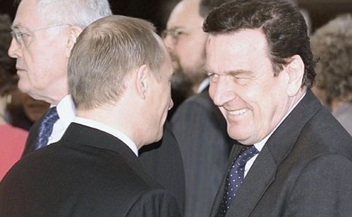President Putin with German Chancellor Gerhard Schroeder before a summit of heads of state and government of the European Union.