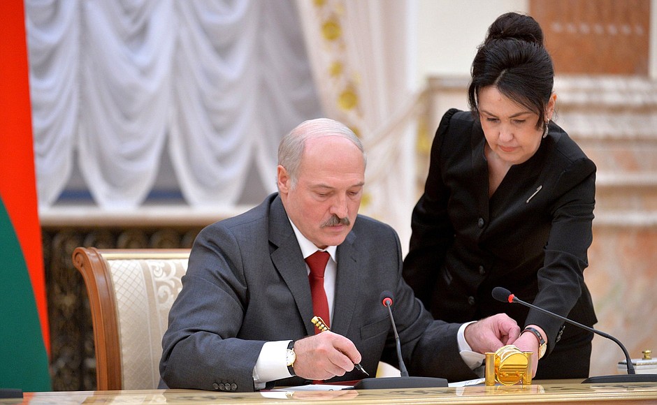 Signing documents following Union State Supreme State Council meeting. President of Belarus Alexander Lukashenko.