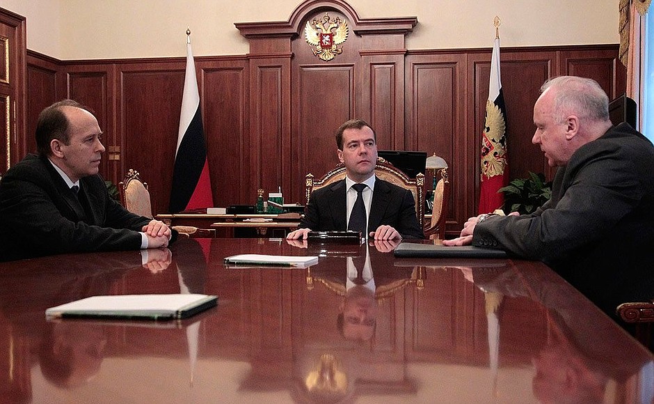 With Federal Security Service Director Alexander Bortnikov (left) and Investigative Committee Chairman Alexander Bastrykin.