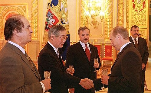 President Putin with Ambassador of Cyprus Andreas Georgiadis (right), Ambassador of Japan Issey Nomura (centre) and Ambassador of Hungary Ferenc Kontra.