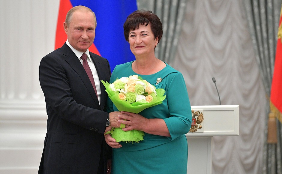 At a presentation of state decorations. Senior research associate of KAUSTIK (Volgograd Region) Nadezhda Levchenko has received the honorary title of Honoured Chemist of the Russian Federation.