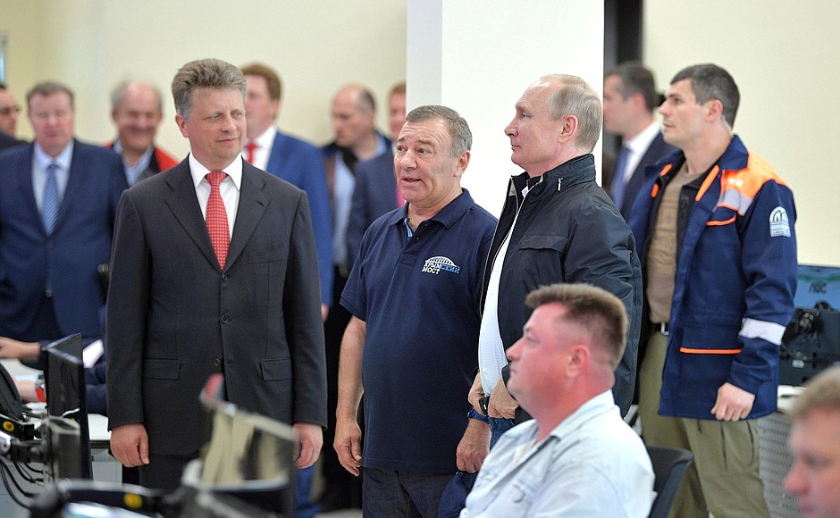 During the visit to the Integrated Transport Control Centre. With Acting Transport Minister Maxim Sokolov, left, and Stroygazmontazh Board Chairman Arkady Rotenberg.