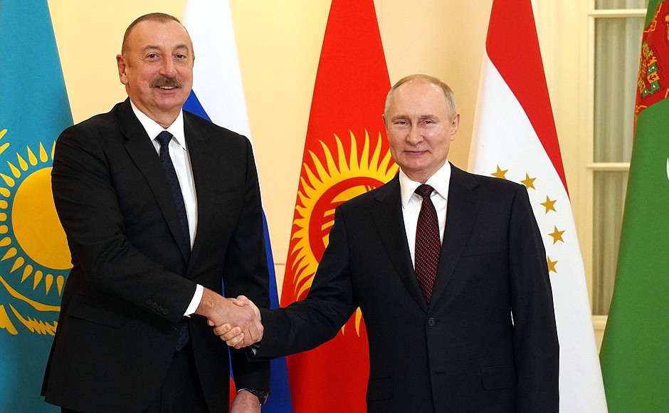 With President of the Republic of Azerbaijan Ilham Aliyev before the informal meeting of the CIS heads of state.
