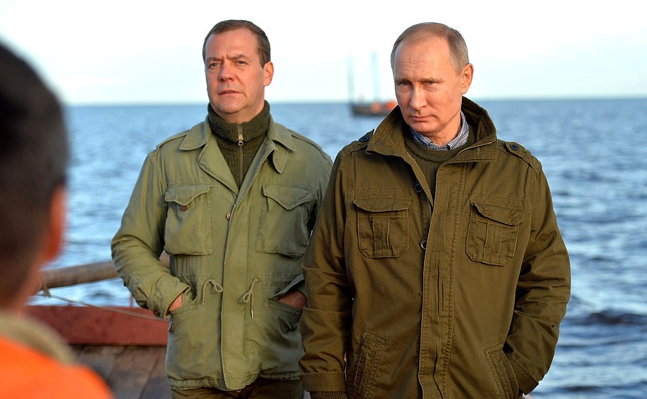 With Prime Minster Dmitry Medvedev in a fishing boat on Lake Ilmen.