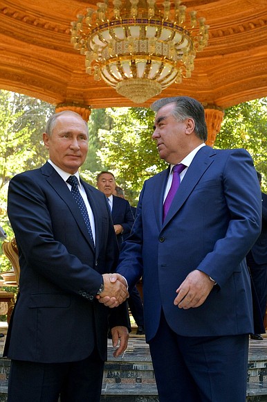 With President of Tajikistan Emomali Rahmon before the Meeting of CIS Heads of State Council.