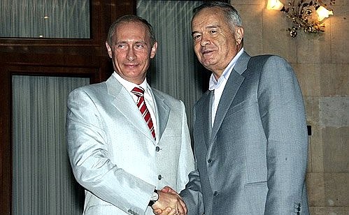 With the President of Uzbekistan, Islam Karimov.