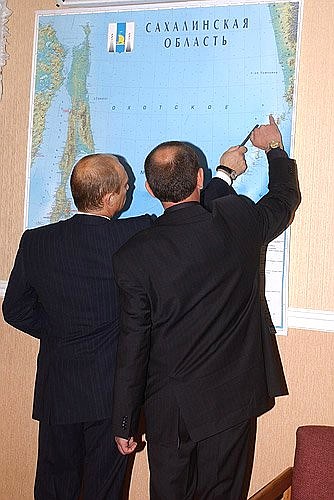 President Putin with Ivan Malakhov, acting Governor of the Sakhalin Region, during a meeting.