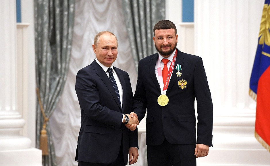 Presenting state decorations to winners of the 2020 Summer Paralympic Games in Tokyo. Paralympic wheelchair fencing champion Artur Yusupov receives the Order of Friendship.