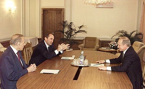 President Vladimir Putin with Azerbaijani President Heidar Aliyev, left, and Armenian President Robert Kocharian.