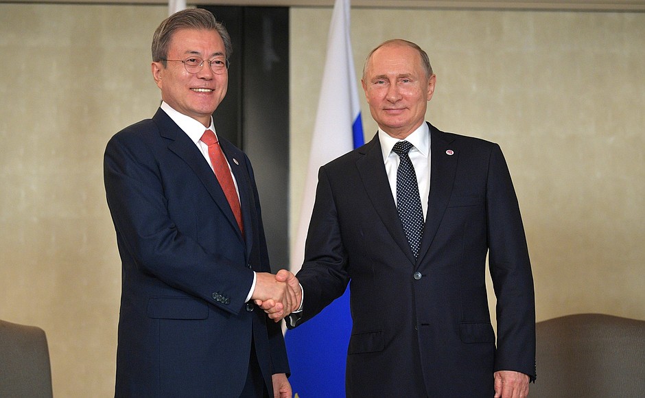 With President of South Korea Moon Jae-in.