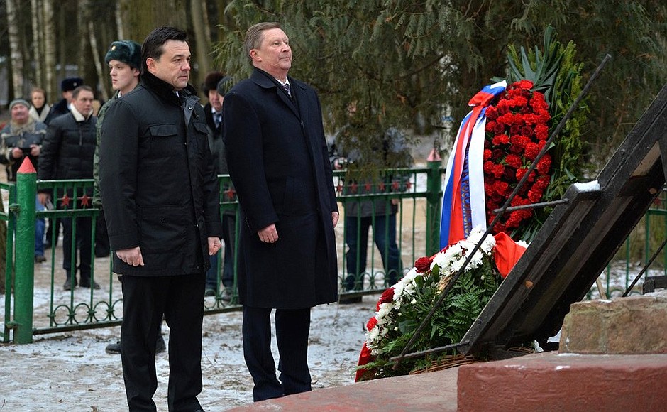 Laying flowers at a common grave for Soviet soldiers. With Governor of Moscow Region Andrei Vorobyov.