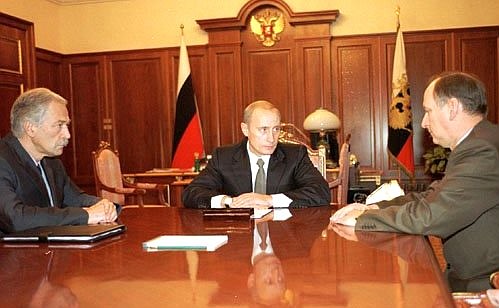President Putin meeting with FSB Director Nikolai Patrushev and Interior Minister Boris Gryzlov.