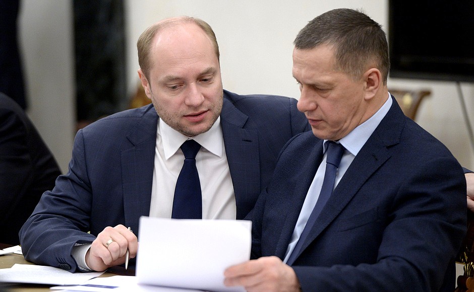 Minister for the Development of the Russian Far East Alexander Galushka and Deputy Prime Minister and Plenipotentiary Presidential Envoy to the Far Eastern Federal District Yury Trutnev before the meeting with Government members.