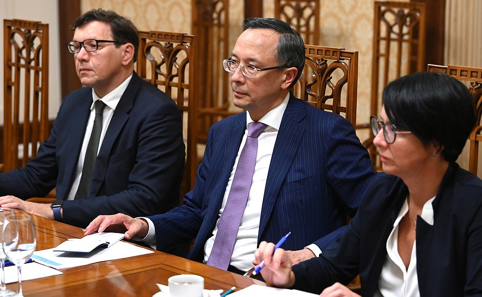 OSCE High Commissioner on National Minorities Kairat Abdrakhmanov, center, at a working meeting with Deputy Chief of Staff of the Presidential Executive Office Magomedsalam Magomedov.
