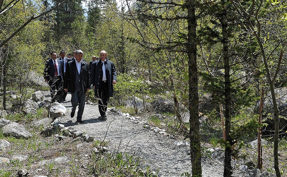With President of Kyrgyzstan Almazbek Atambayev during a walk along the Ala-Archa gorge.