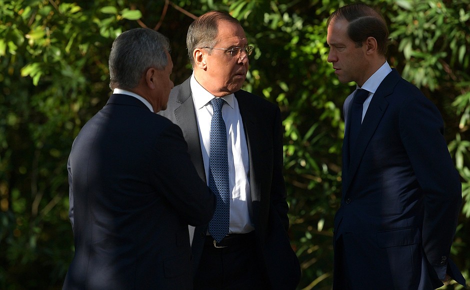 Defence Minister Sergei Shoigu (left), Foreign Minister Sergei Lavrov and Minister of Industry and Trade Denis Manturov (right) following the Russian-Egyptian talks.