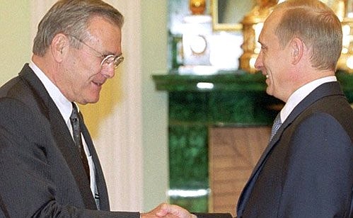 President Putin with US Secretary of Defence Donald Rumsfeld.