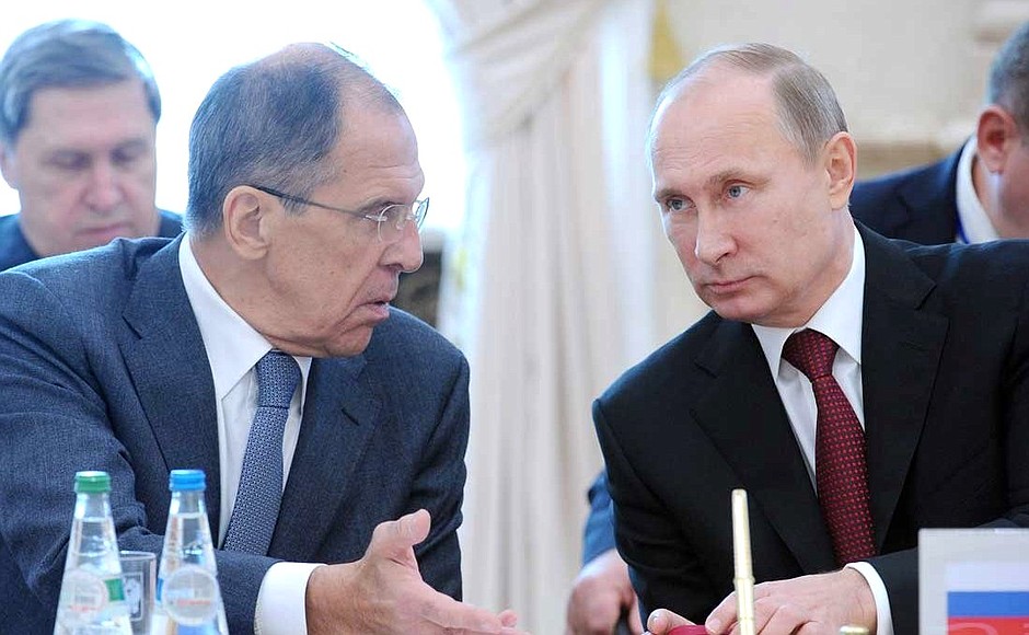 With Foreign Minister Sergei Lavrov at a meeting of the CIS Council of Heads of State.