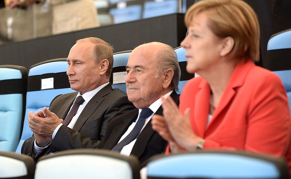 Before the start of the 2014 FIFA World Cup’s closing ceremony. With German Federal Chancellor Angela Merkel and FIFA President Joseph Blatter.