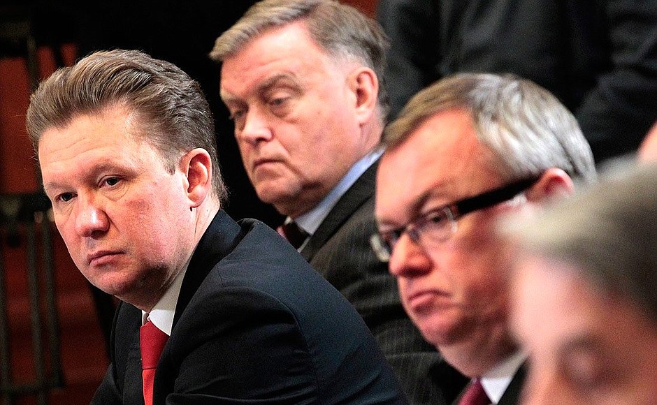 Gazprom CEO Alexei Miller (left), Russian Railways CEO Vladimir Yakunin (in the background), and VTB Bank CEO Andrei Kostin (right) at the meeting of the Board of Trustees of the Charity Fund for the Restoration of the New Jerusalem Resurrection Monastery.