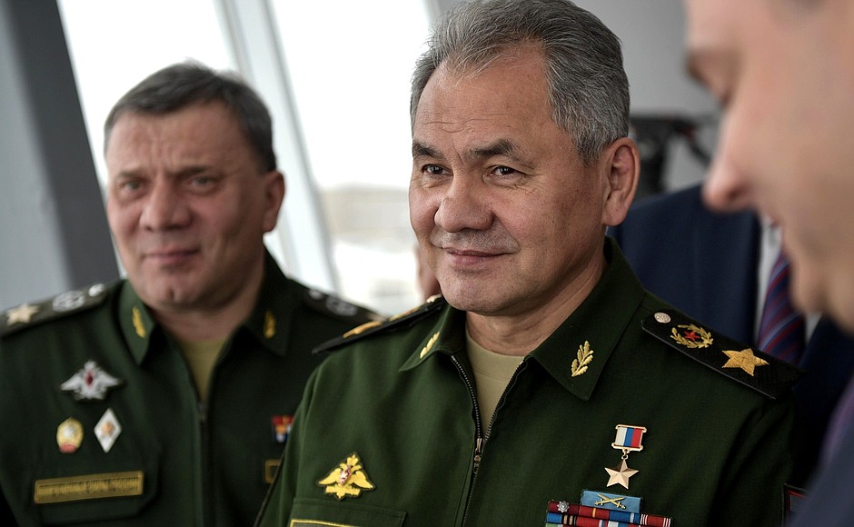 Defence Minister Sergei Shoigu and Deputy Defence Minister Yury Borisov (left) at the Gorbunov Aviation Factory in Kazan.