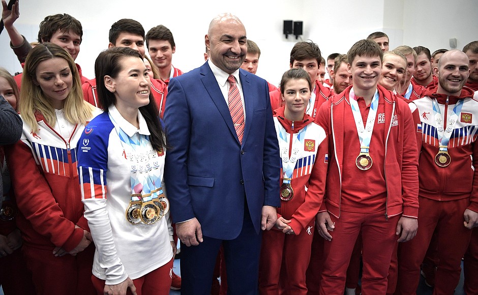 At the Olympic Synchronised Swimming Centre of Anastasia Davydova. At the meeting with participants of the 2019 Winter Universiade held in Krasnoyarsk.