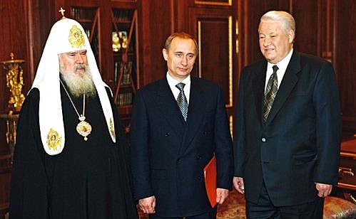 President Boris Yeltsin with Patriarch Alexy II of Moscow and All Russia and Prime Minister Vladimir Putin.