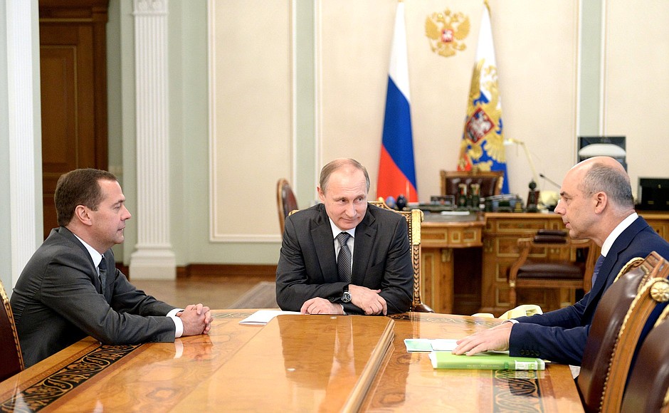 With Prime Minister Dmitry Medvedev and Finance Minister Anton Siluanov.