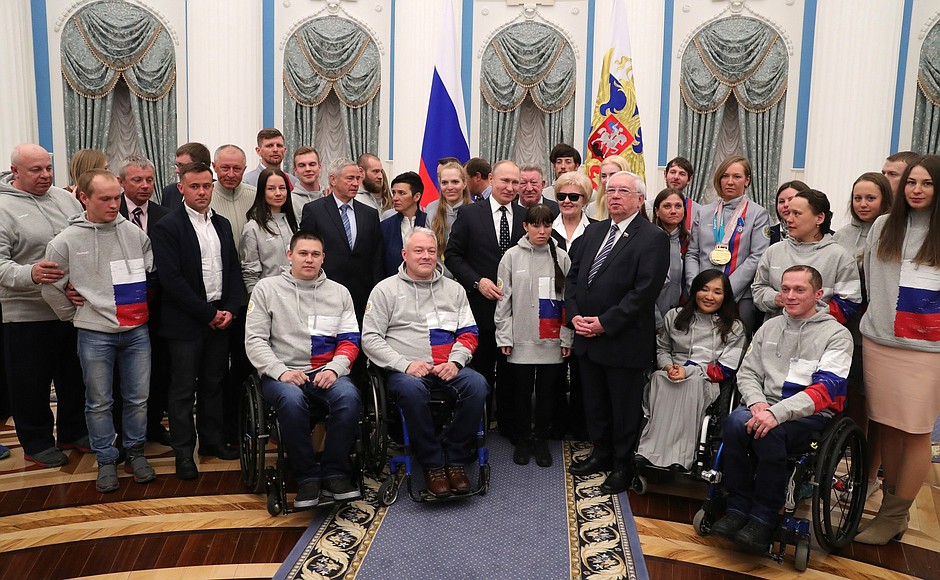 With participants of the PyeongChang 2018 Paralympic Winter Games.