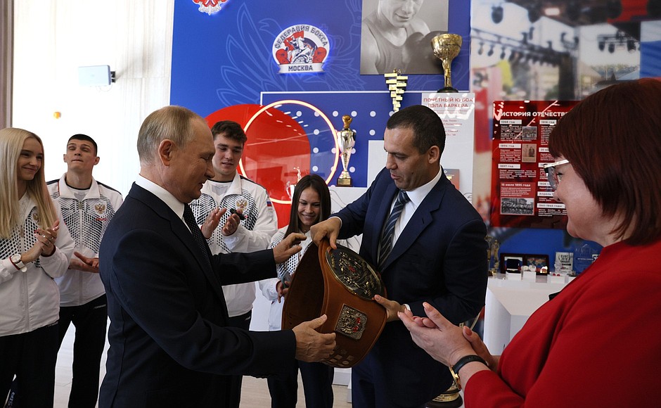 Visit to the International Boxing Centre at Luzhniki. International Boxing Association President Umar Kremlyov presented the National Leader boxing belt to the President.