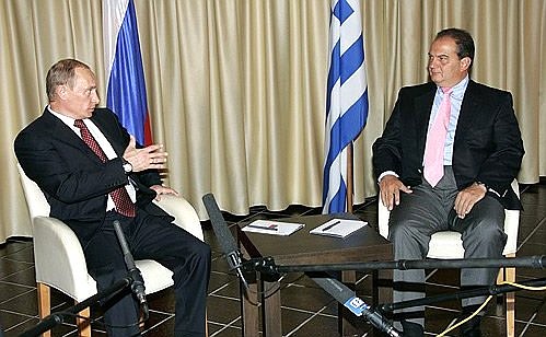 With Greek Prime Minister Kostas Karamanlis.