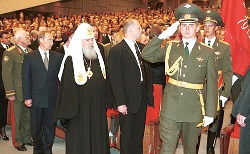 A concert held to mark the 55th victory in the Second World War. Mr Putin with Defence Minister Igor Sergeyev (left) and Patriarch of Moscow and All Russia Alexy II.