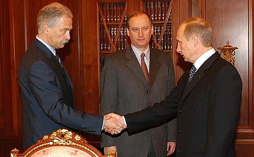 President Vladimir Putin with Federal Security Service Director Nikolai Patrushev and Internal Affairs Minister Boris Gryzlov.