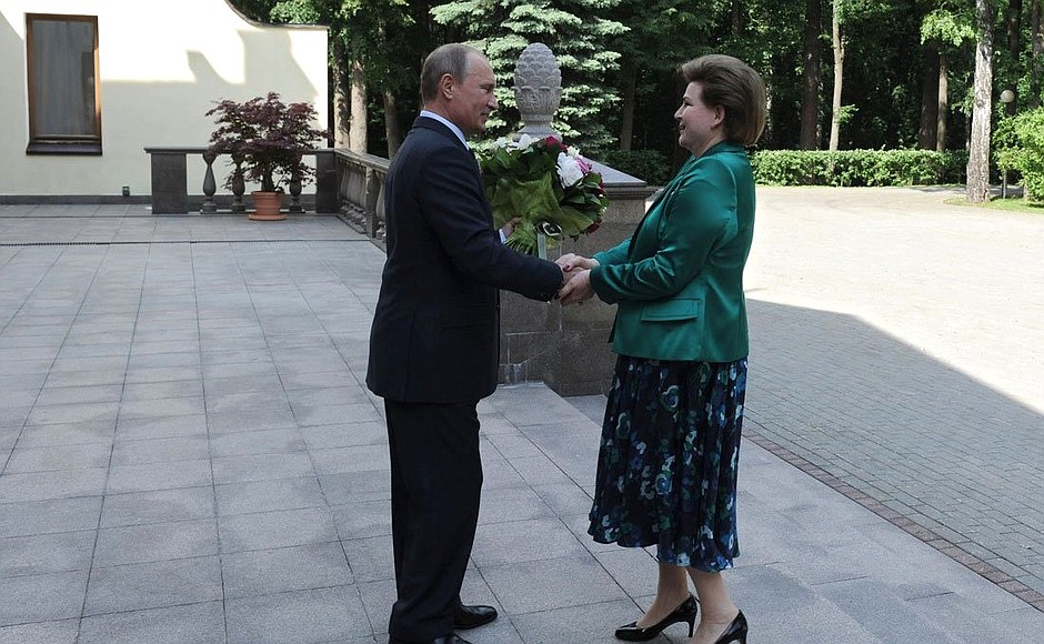 With Major General Valentina Tereshkova, Hero of the Soviet Union and the first woman cosmonaut.