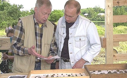 At an archeological dig site. On the left is the Head of the archeological expedition, academician of the RAS Anatoly Kirpichnikov.