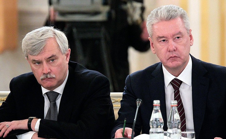 At State Council meeting. Moscow Mayor Sergei Sobyanin (right) and St Petersburg Governor Georgy Poltavchenko.