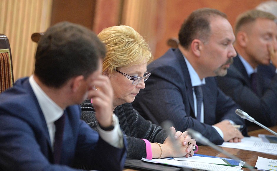 Minister of Labour and Social Protection Maxim Topilin, Healthcare Minister Veronika Skvortsova, Minister of Construction and Housing and Utilities Mikhail Men, and Minister of Education and Science Dmitry Livanov at a meeting on Ingushetia’s socioeconomic development.