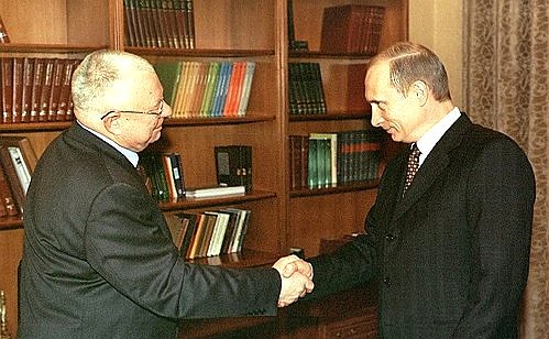 President Putin with Anatoly Pristavkin, an advisor to the President on pardon issues.