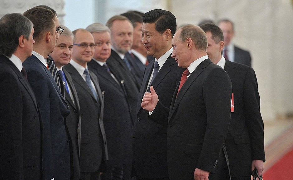 С Председателем КНР Си Цзиньпином. Церемония представления российской делегации.