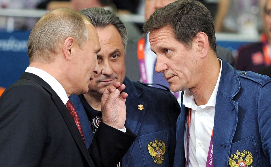 Olympic judo final match. With Sports Minister Vitaly Mutko and President of the Russian Olympic Committee Alexander Zhukov (left to right).